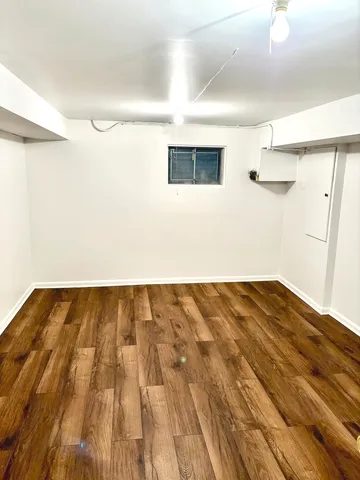 a kitchen with a stove a microwave and a sink