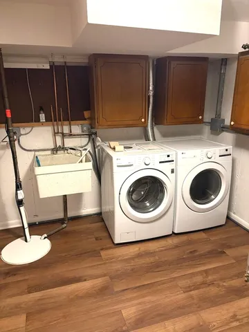 a view of a back yard of the house and a chair