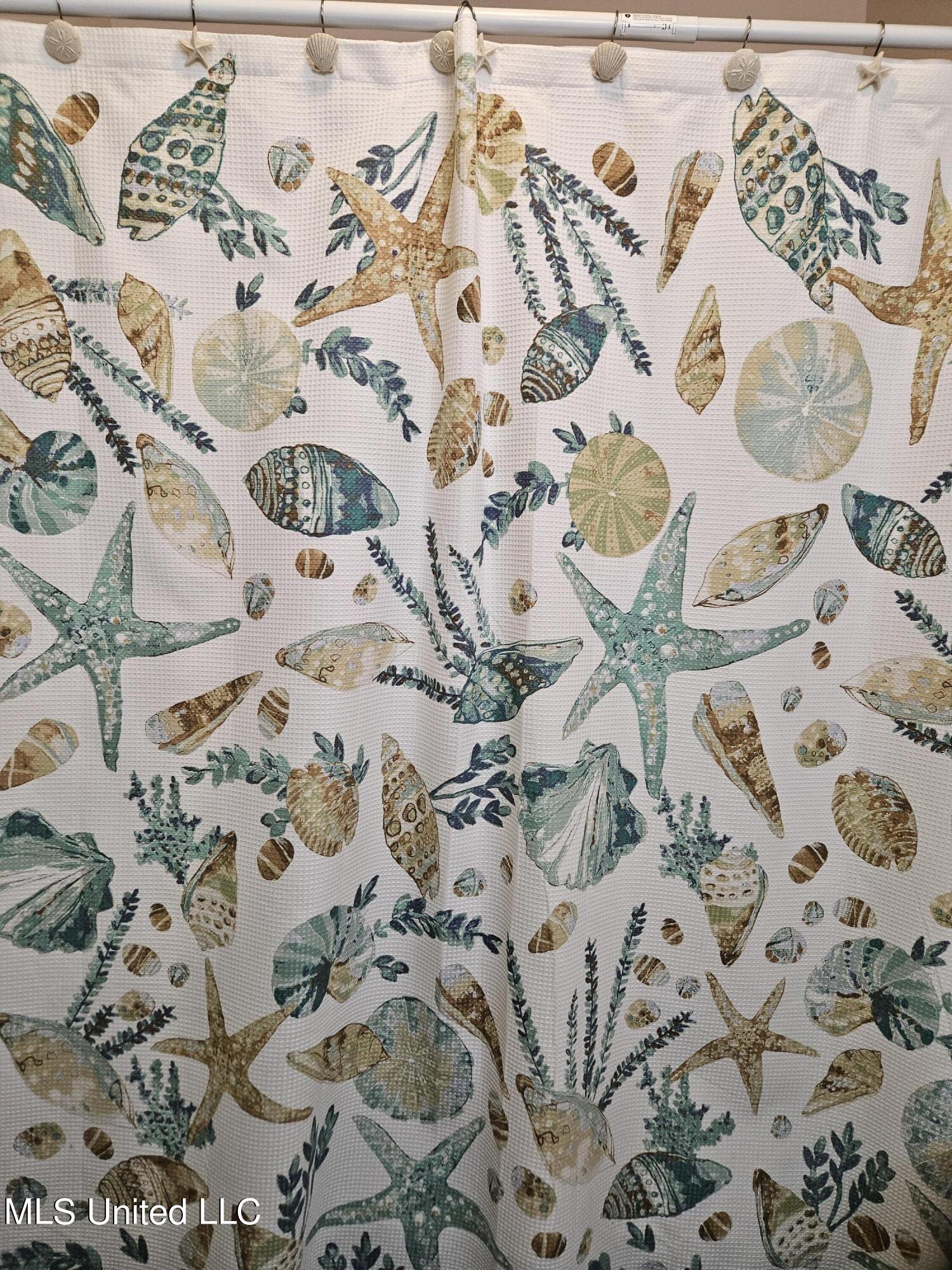 10646 Plummer Circle Gulfport, MS 39503 - Photo 23 of 43 Primary bathroom shower curtain