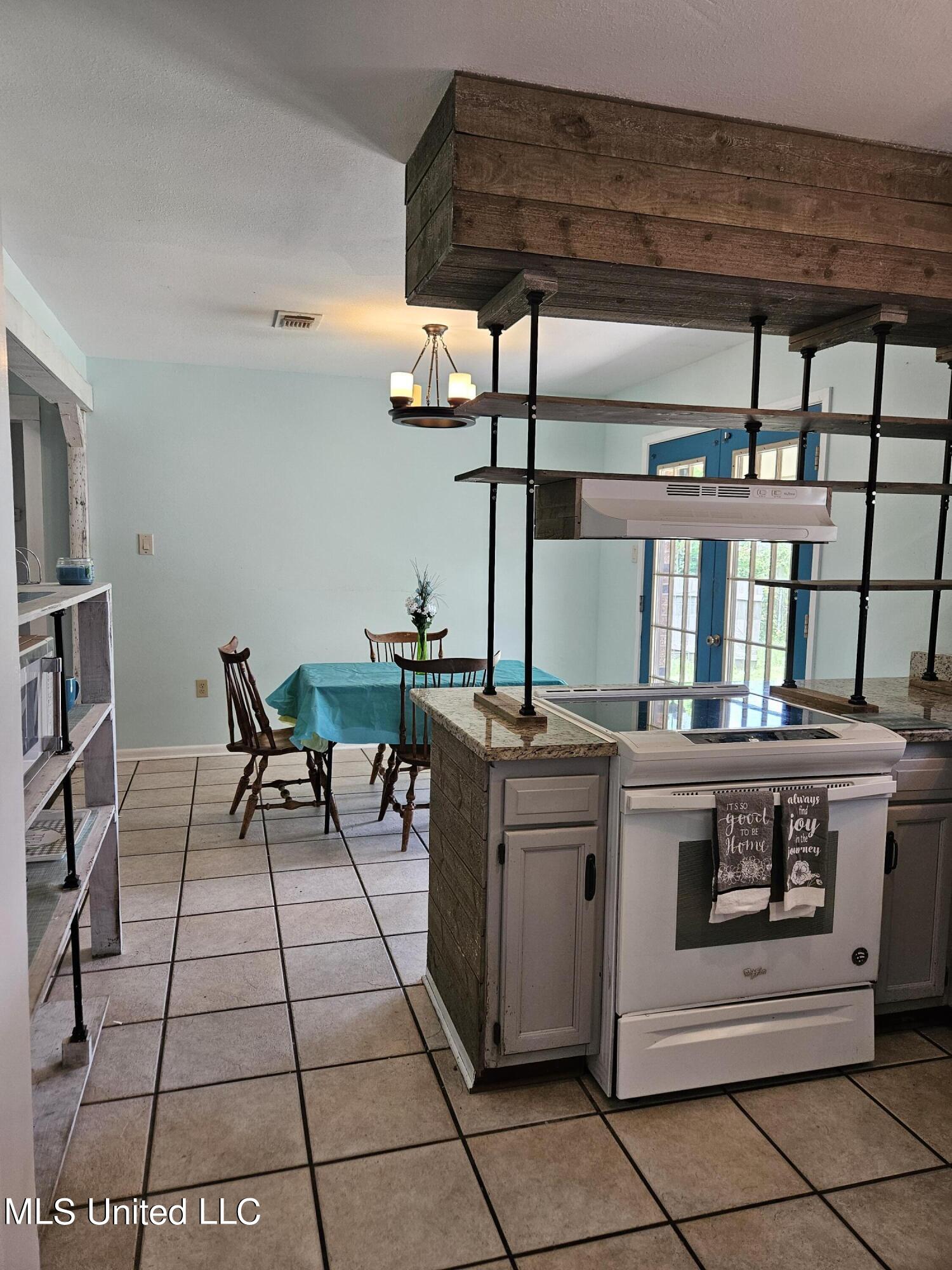 10646 Plummer Circle Gulfport, MS 39503 - Photo 7 of 43 Kitchen looking into dining room