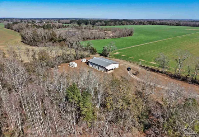 a view of a field with an outdoor space