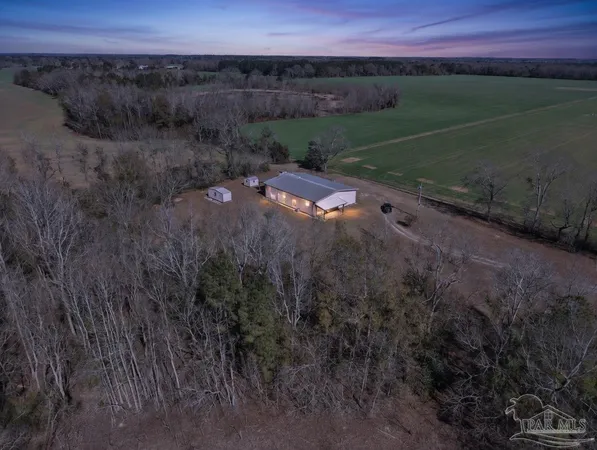 a view of a field with an outdoor space