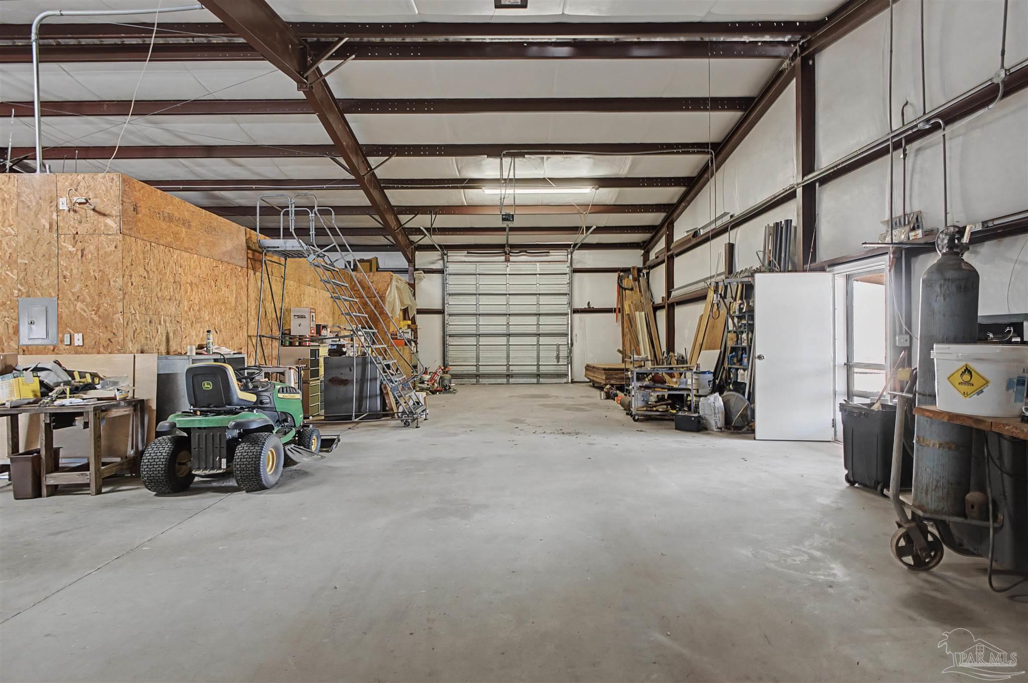 3401 Rocky Road Jay, FL 32565 - Photo 32 of 49 a view of a room with gym equipment
