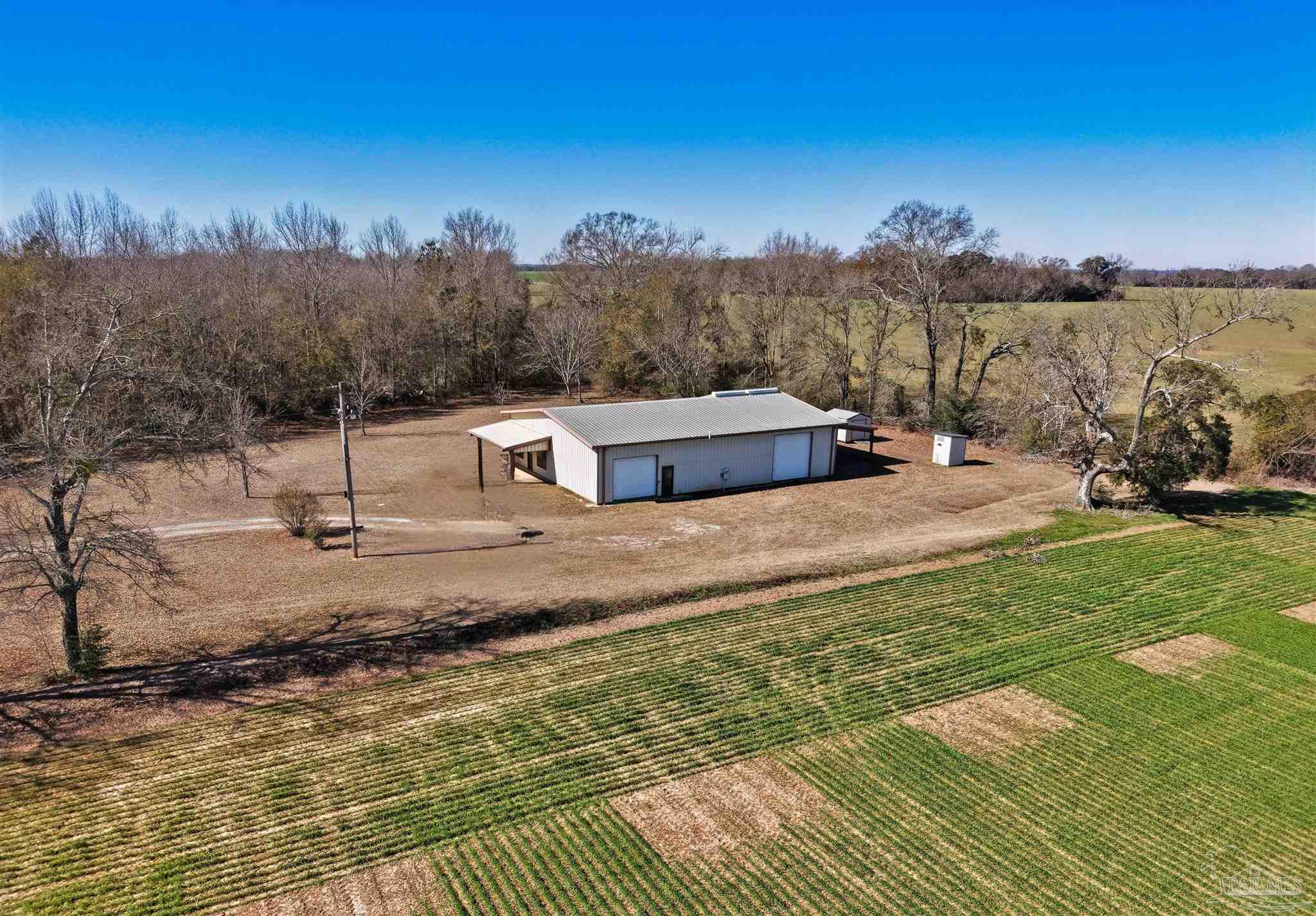 3401 Rocky Road Jay, FL 32565 - Photo 34 of 45 a view of a house with a yard