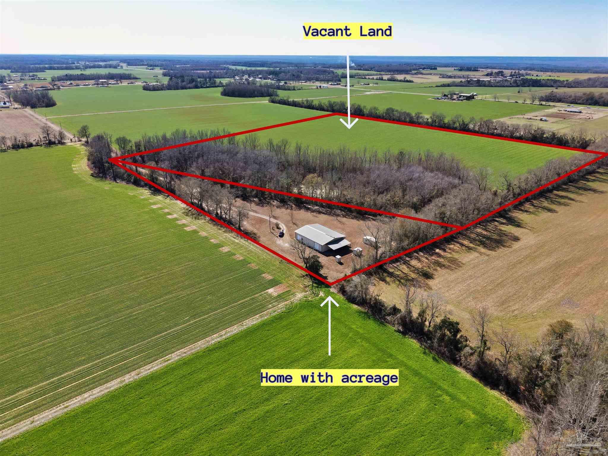 3401 Rocky Road Jay, FL 32565 - Photo 47 of 49 a view of a golf course with a garden