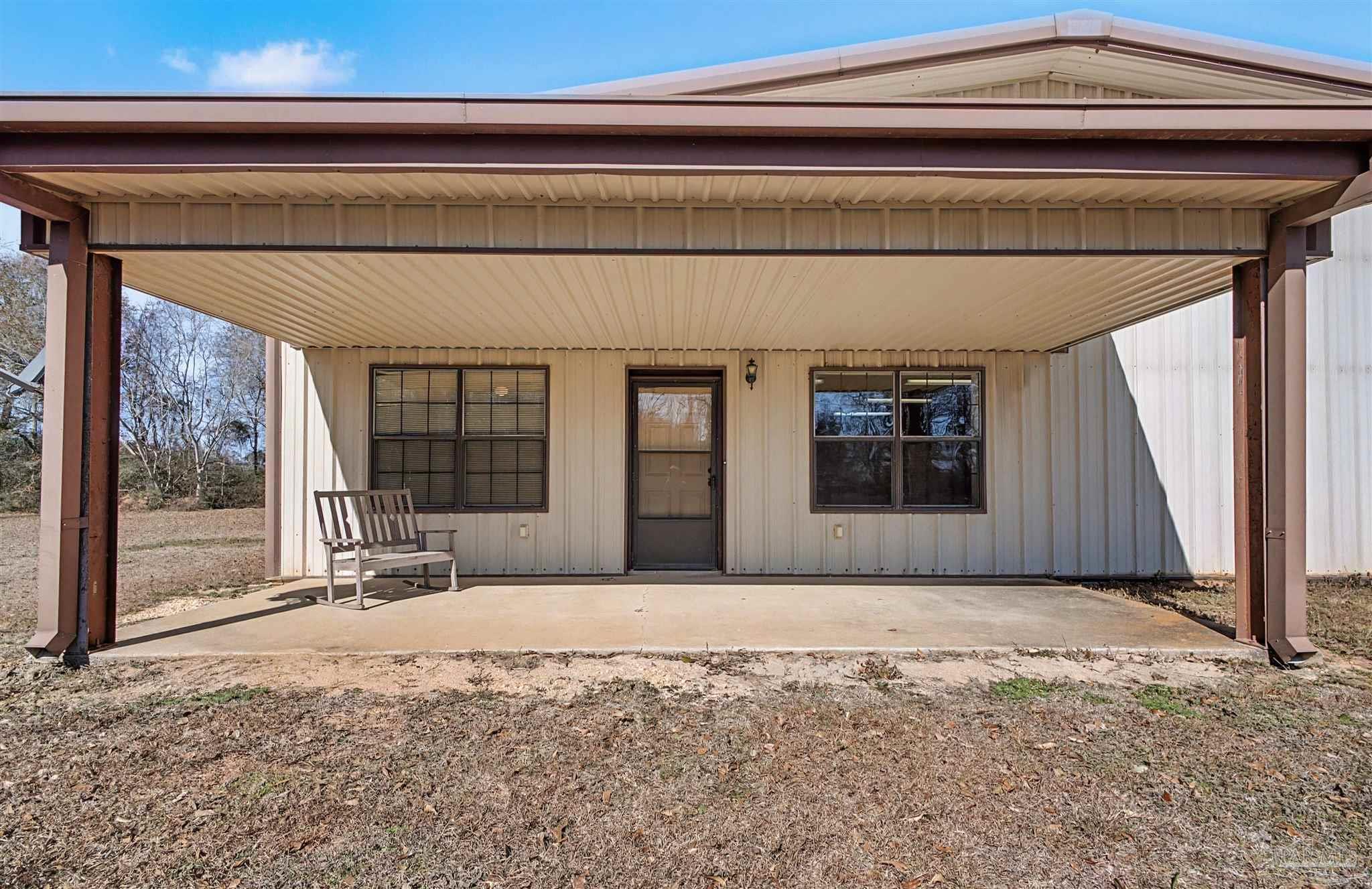 3401 Rocky Road Jay, FL 32565 - Photo 8 of 45 a view of an entrance door of the house