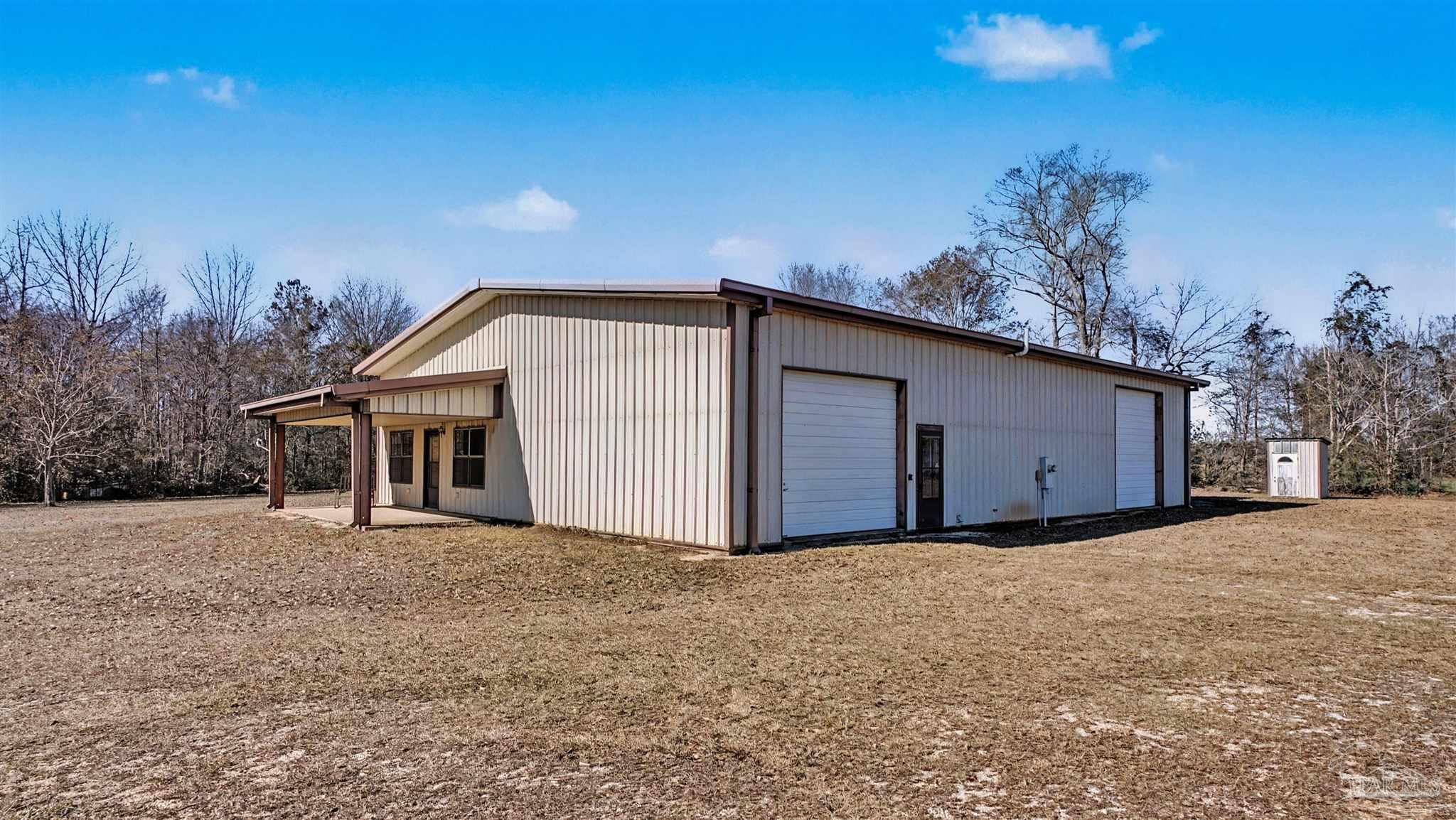 3401 Rocky Road Jay, FL 32565 - Photo 9 of 49 a view of a house with a outdoor space