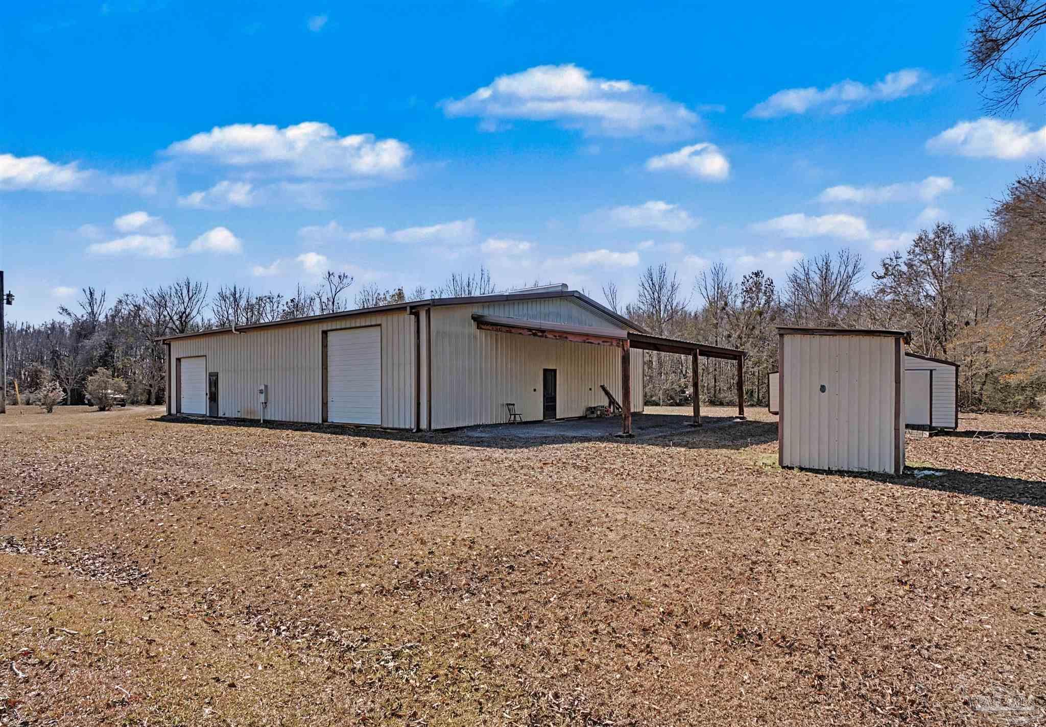 3401 Rocky Road Jay, FL 32565 - Photo 10 of 49 a view of a house with a yard