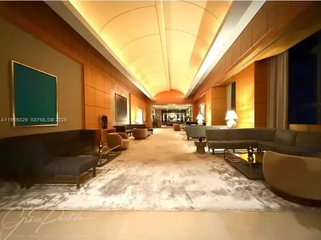 a swimming pool with outdoor seating and yard