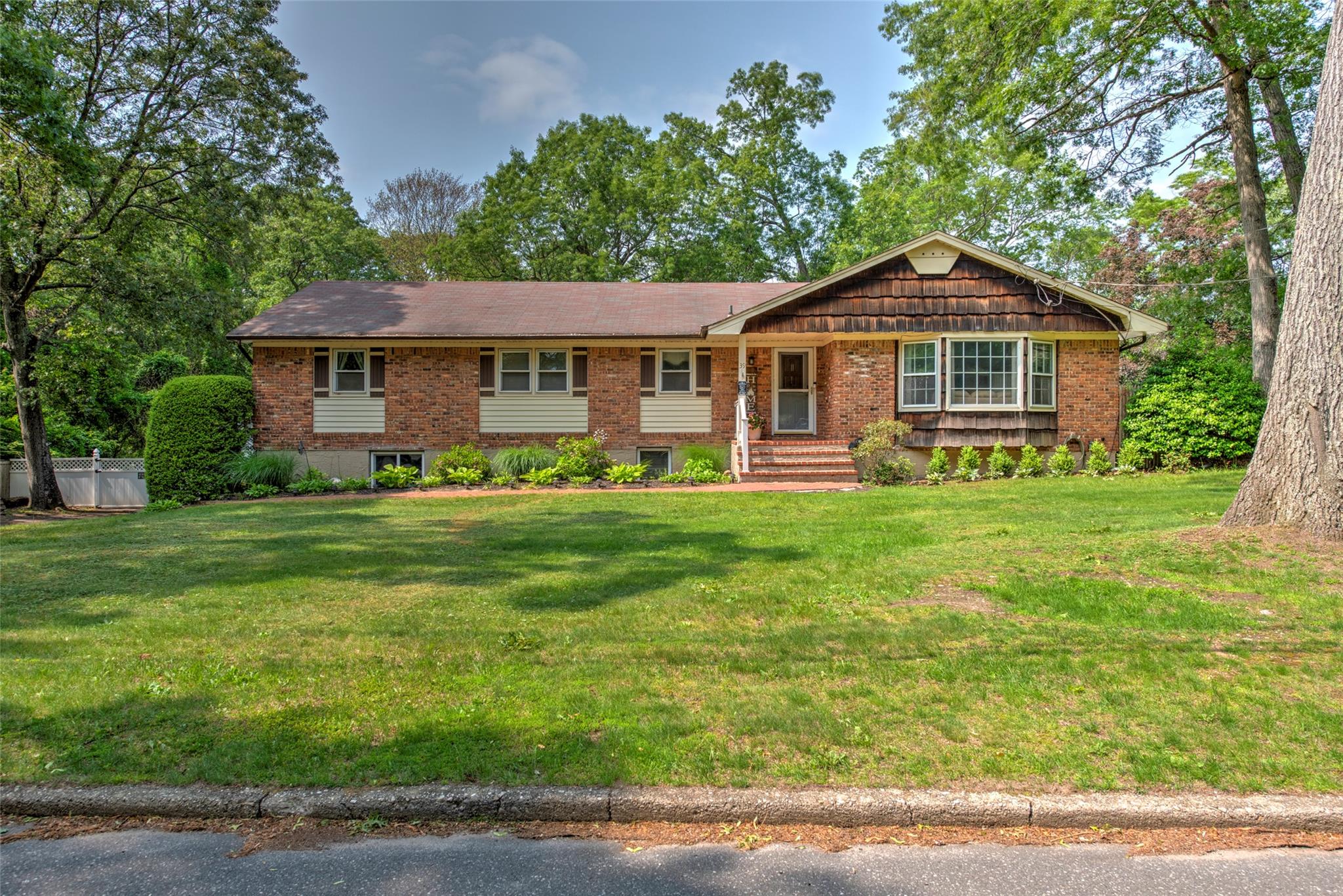39 Cornwallis Road East Setauket, NY 11733 - Photo 1 of 1 Single story home with a front lawn and brick siding