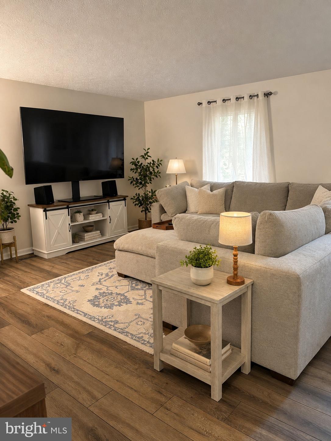 11013 Barton Hill Court Reston, VA 20191 - Photo 2 of 9 Sunny Living Room (semi virtually staged)