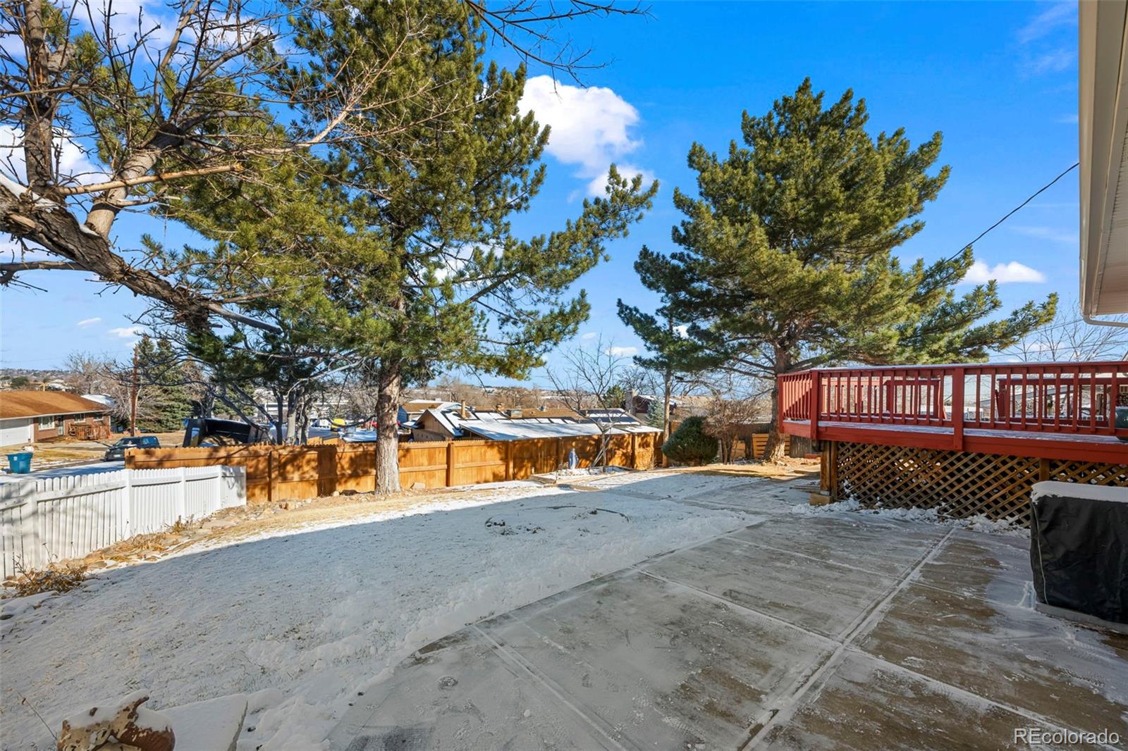 8213 Adams Way Denver, CO 80221 - Photo 19 of 22 a view of swimming pool with an outdoor space and seating area