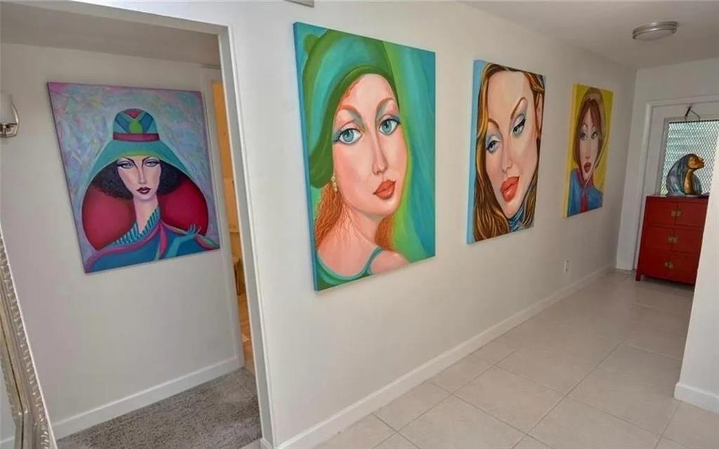 1225 Northwest 21st Street, Unit 3507 Stuart, FL 34994 - Photo 13 of 18 a view with painting on the wall