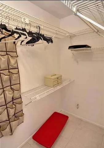 a view of a room with racks on the wall