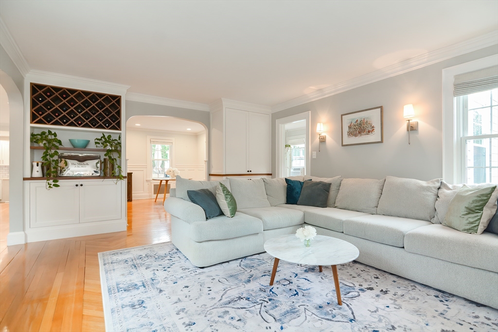 1133 Brook Road Milton, MA 02186 - Photo 15 of 40 a living room with furniture and a wooden floor