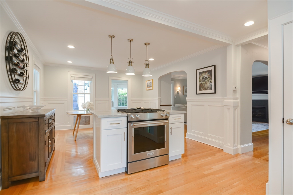 1133 Brook Road Milton, MA 02186 - Photo 23 of 40 a kitchen with a stove and a refrigerator