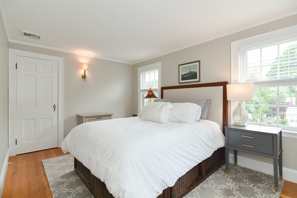 1133 Brook Road Milton, MA 02186 - Photo 32 of 40 a bedroom with a bed and a window