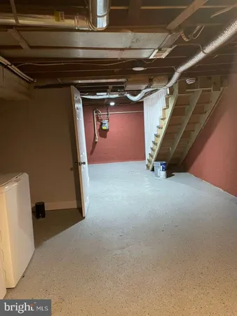 a view of a room with an empty space