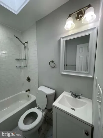 a bathroom with a sink and a toilet