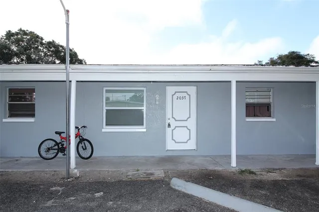 a house view with a outdoor space
