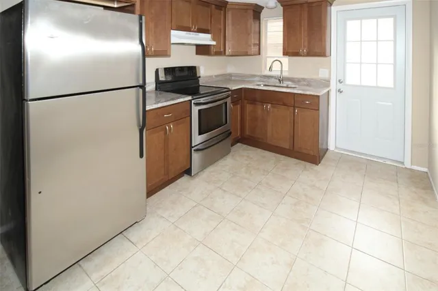 an empty room with a windows