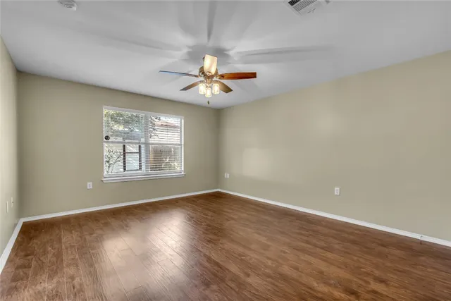 a view of kitchen with stainless steel appliances kitchen island granite countertop a refrigerator and a sink