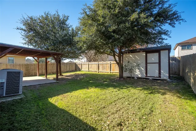 a view of backyard of house