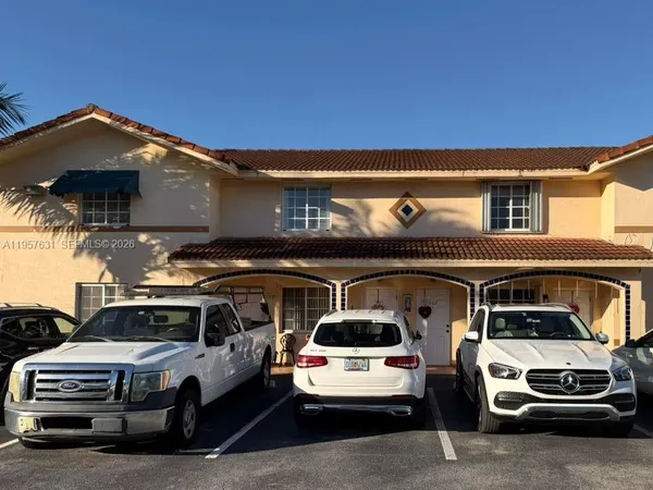 a car parked in front of a building