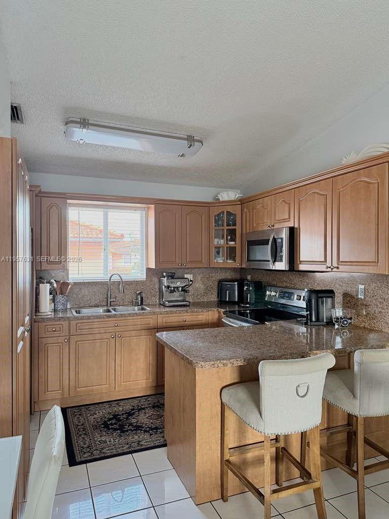 10017 West Okeechobee Road, Unit 201 Hialeah Gardens, FL 33016 - Photo 12 of 34