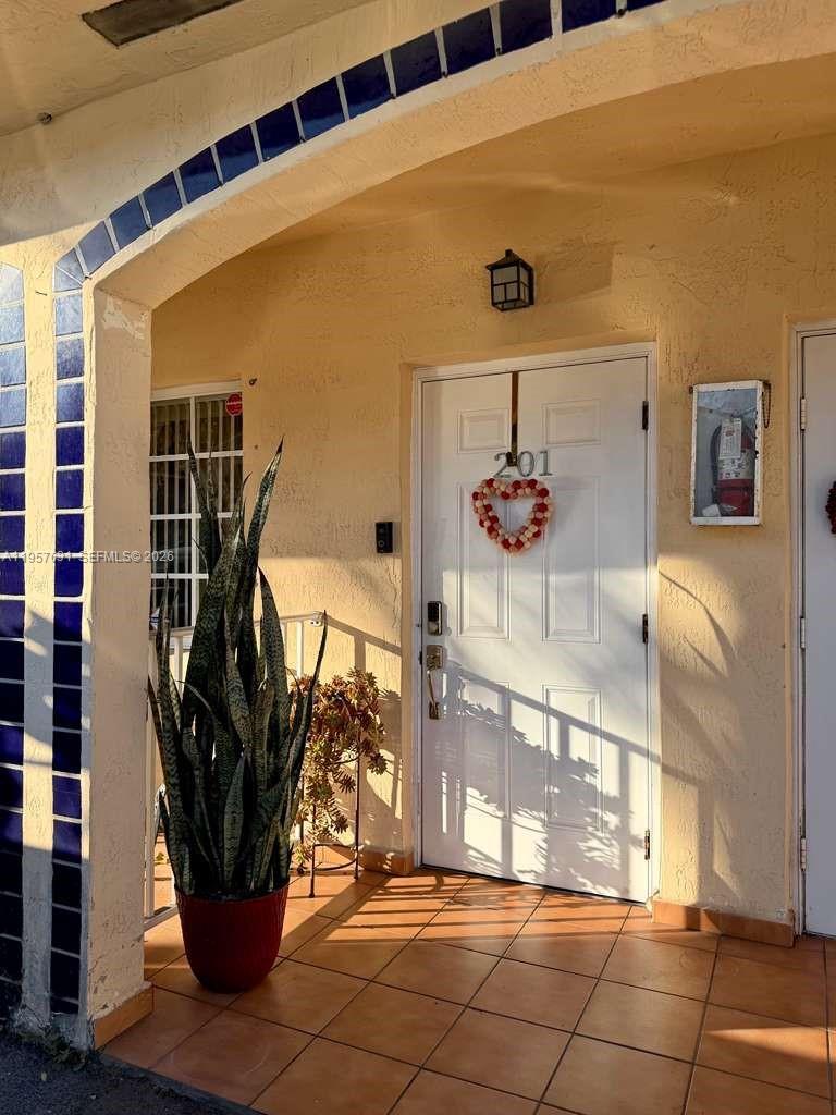 10017 West Okeechobee Road, Unit 201 Hialeah Gardens, FL 33016 - Photo 2 of 34