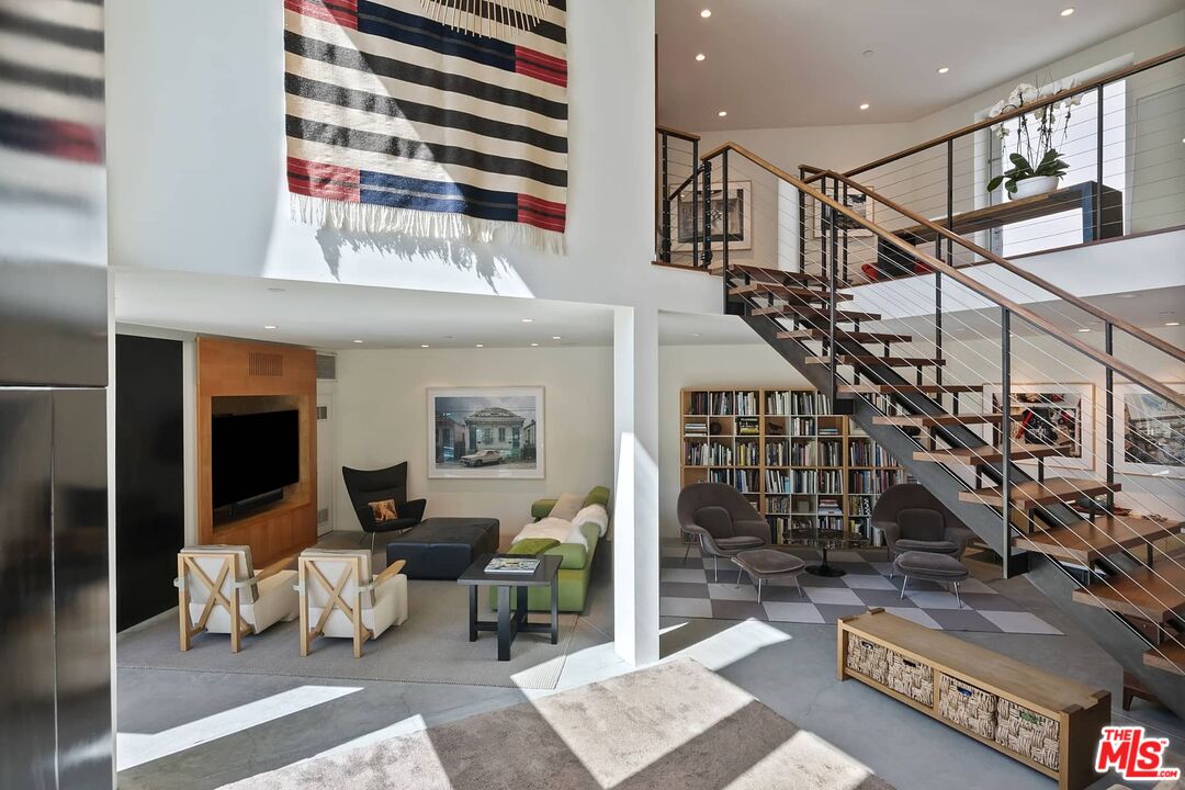 12310 Rochedale Lane Los Angeles, CA 90049 - Photo 11 of 53 a living room with furniture or wooden floor and a potted plant