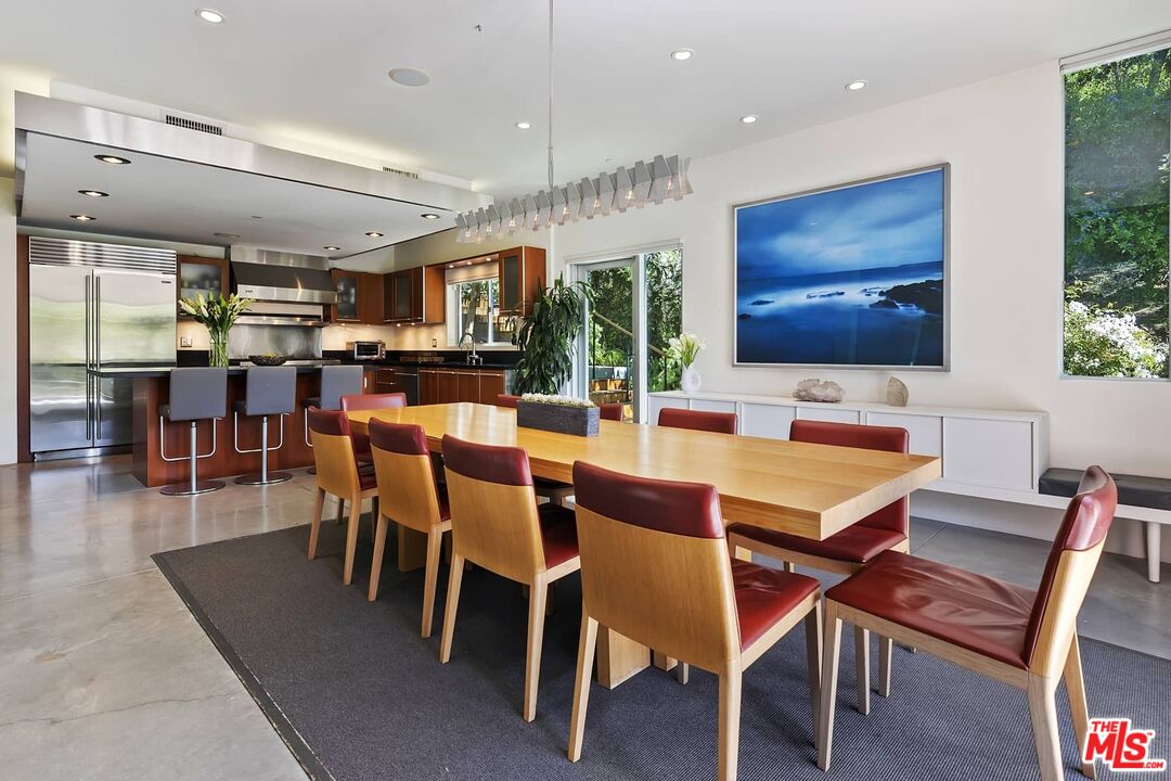 12310 Rochedale Lane Los Angeles, CA 90049 - Photo 17 of 53 a view of a dining room with furniture