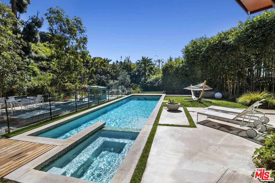 12310 Rochedale Lane Los Angeles, CA 90049 - Photo 24 of 53 a view of swimming pool with chairs
