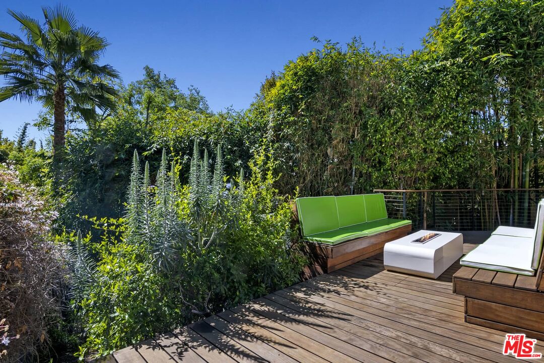 12310 Rochedale Lane Los Angeles, CA 90049 - Photo 30 of 53 a view of a chairs in a patio
