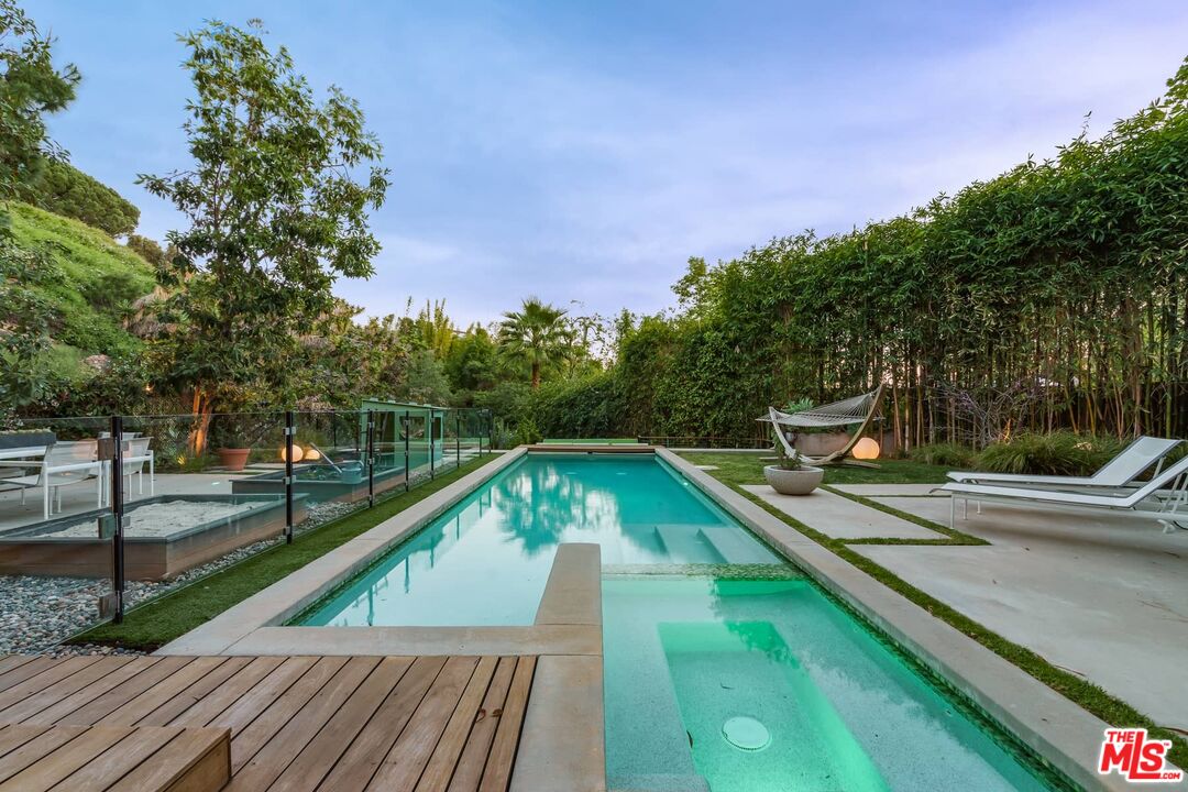 12310 Rochedale Lane Los Angeles, CA 90049 - Photo 43 of 53 a view of a balcony with mountain view