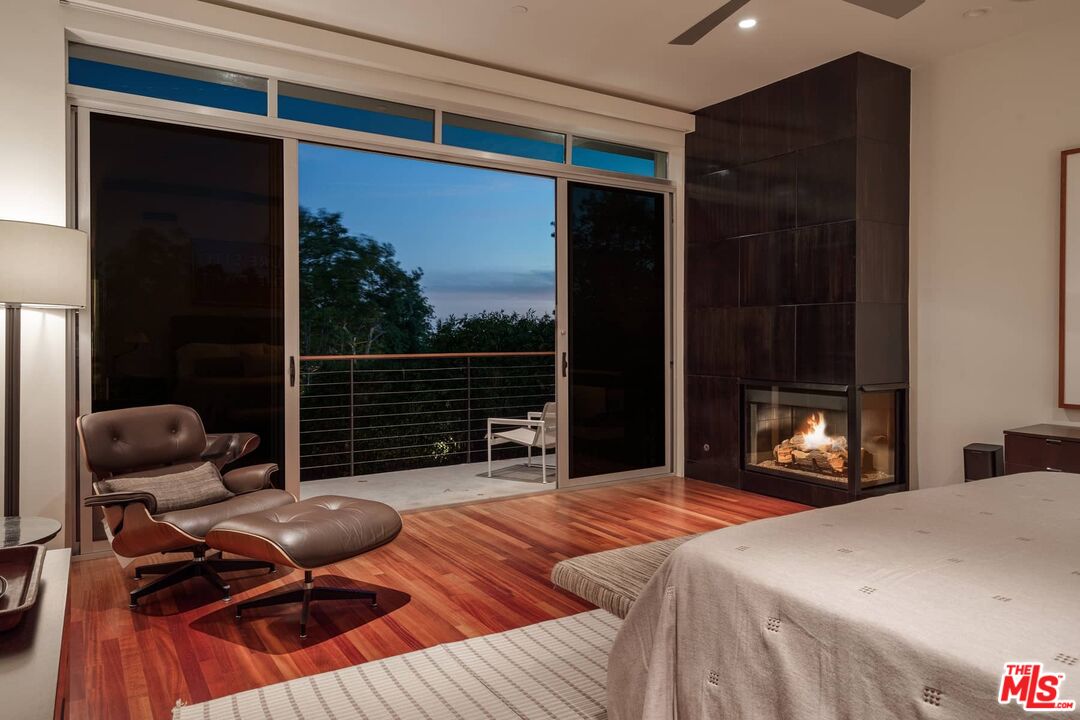 12310 Rochedale Lane Los Angeles, CA 90049 - Photo 45 of 53 a bedroom with furniture and a window