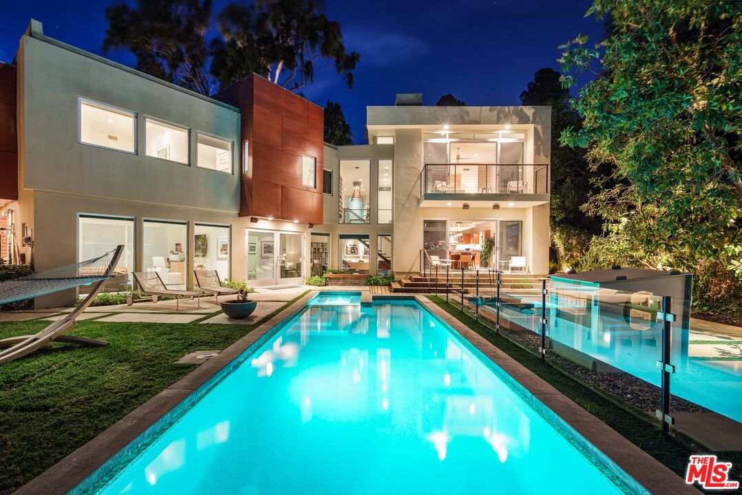 12310 Rochedale Lane Los Angeles, CA 90049 - Photo 49 of 53 a view of a house with swimming pool