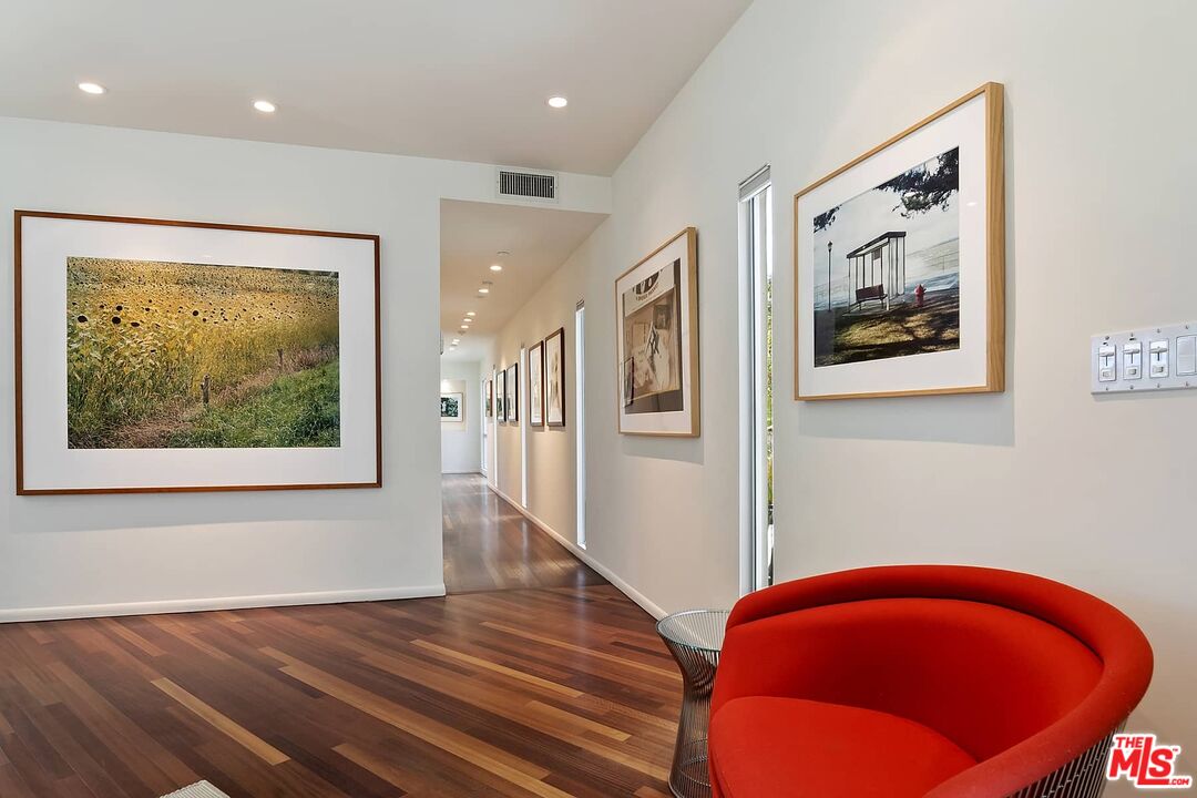 12310 Rochedale Lane Los Angeles, CA 90049 - Photo 5 of 53 a view of a hallway with wooden floor