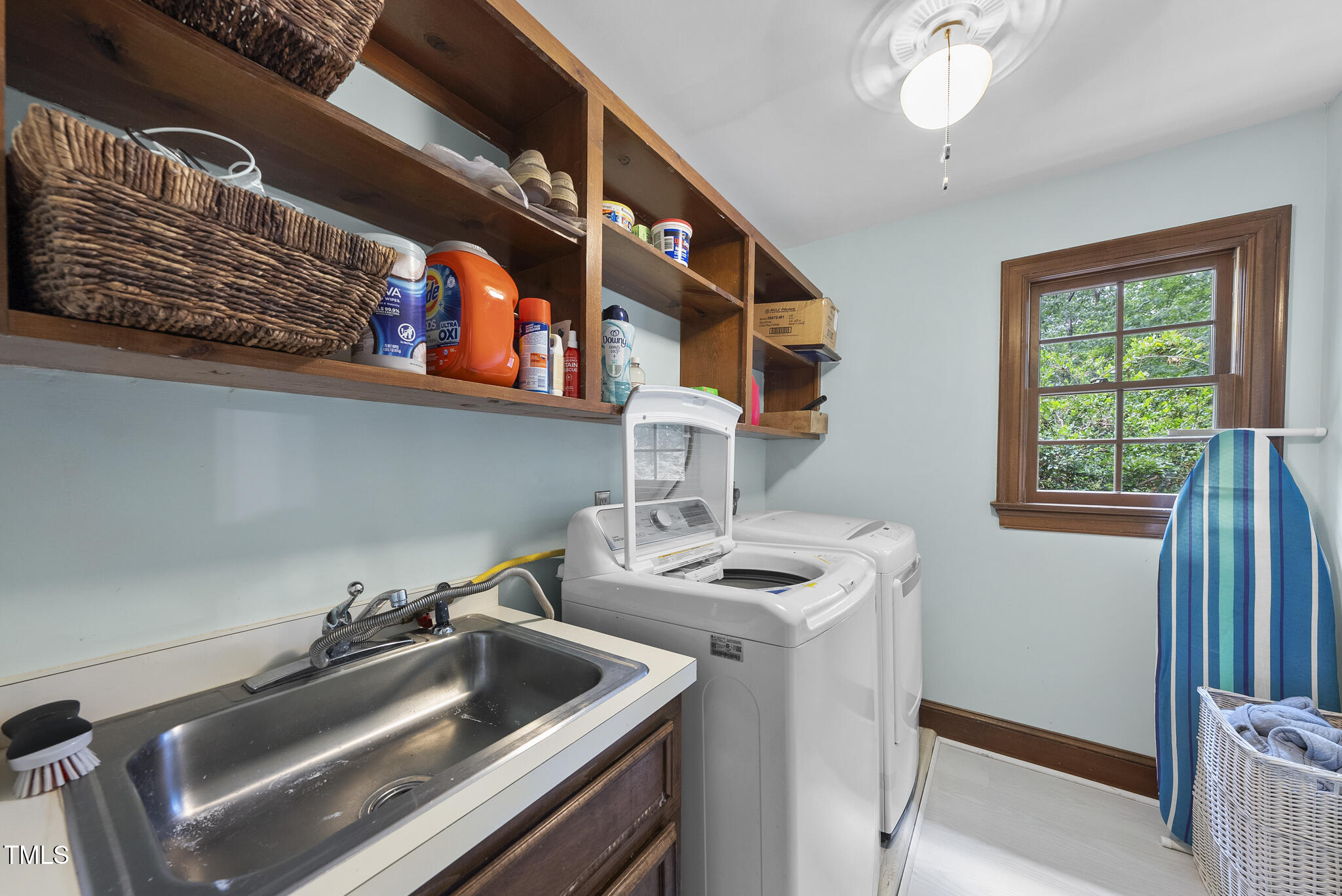 821 Ascot Lane Raleigh, NC 27615 - Photo 32 of 43 a utility room with dryer and washer