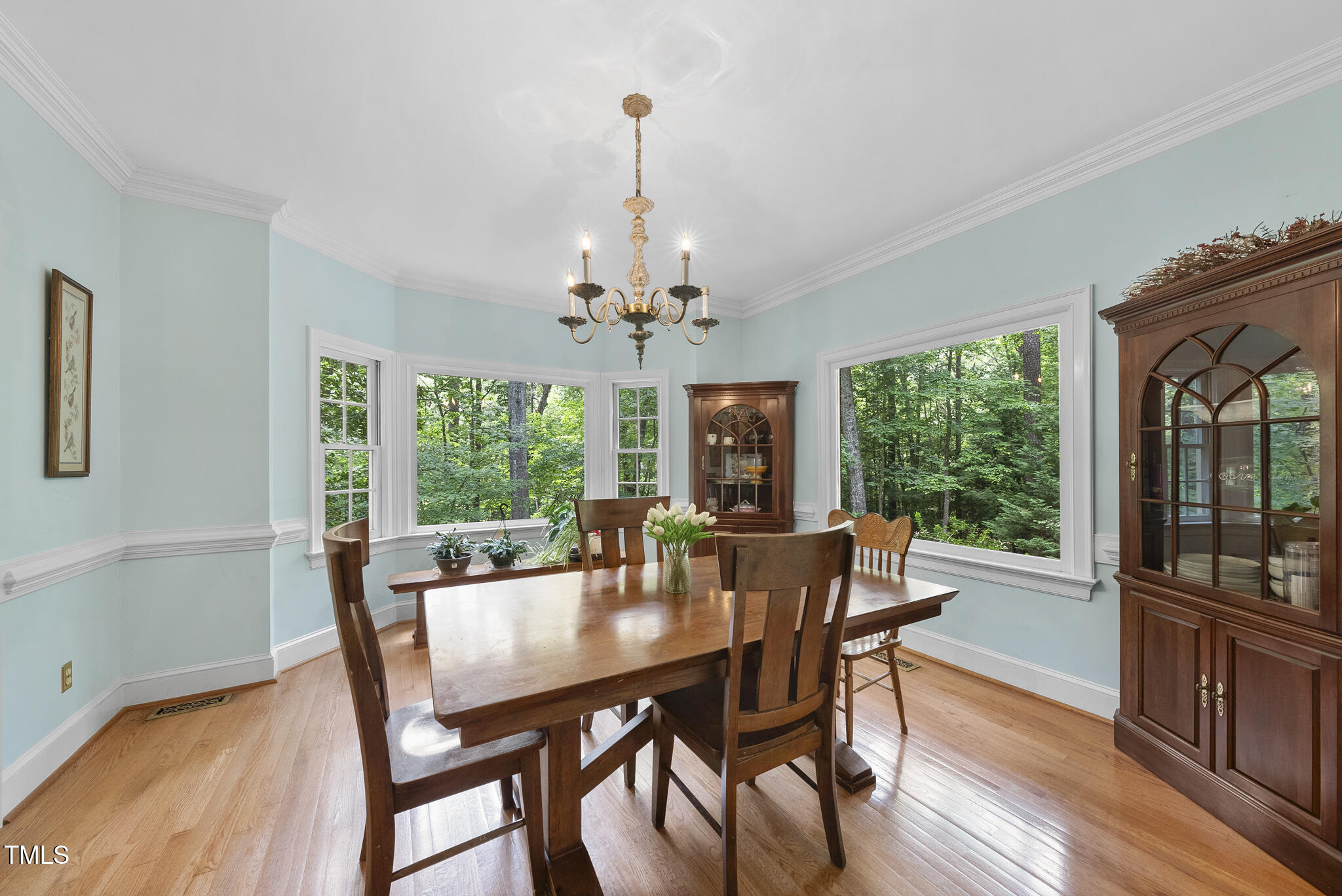 821 Ascot Lane Raleigh, NC 27615 - Photo 7 of 43 a view of a dining room with furniture window and outside view