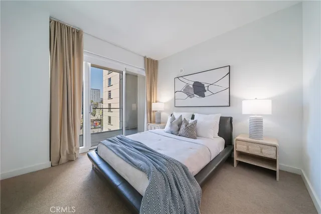 a outdoor living space with furniture and a potted plant