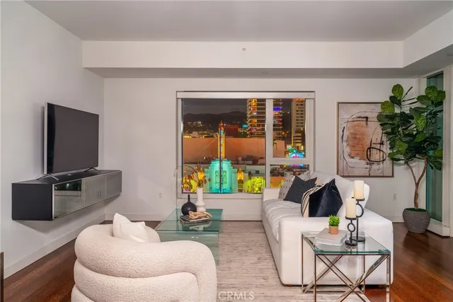 a large bathroom with a double vanity sink a mirror and a bathtub