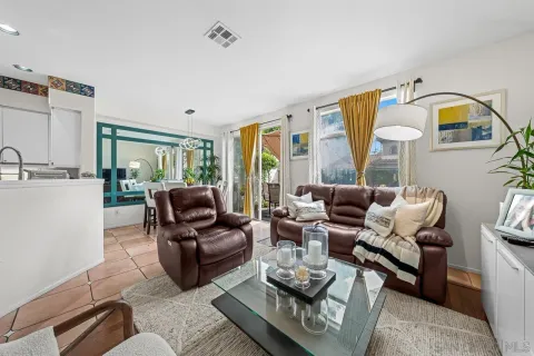 a living room with furniture and a table