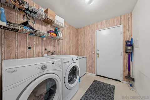 a view of livingroom with washer and dryer