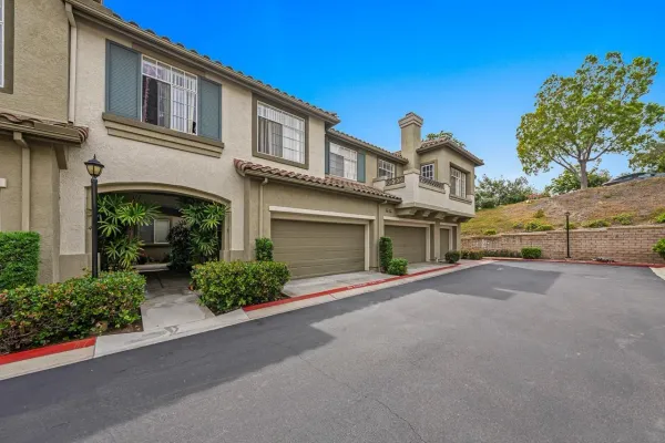 front view of a house with a street