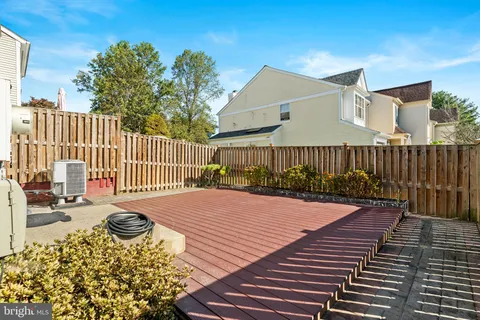 a view of a backyard with a deck
