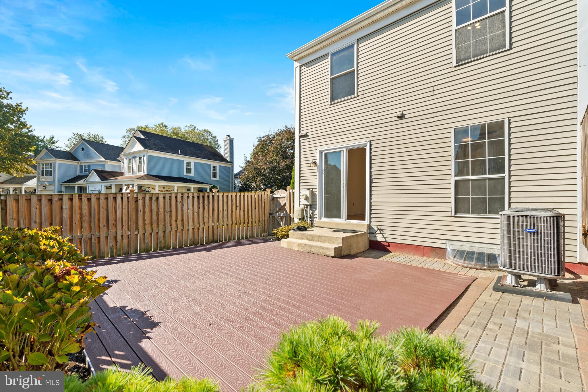 14801 Hammersmith Circle Silver Spring, MD 20906 - Photo 12 of 29 a view of a backyard with a deck