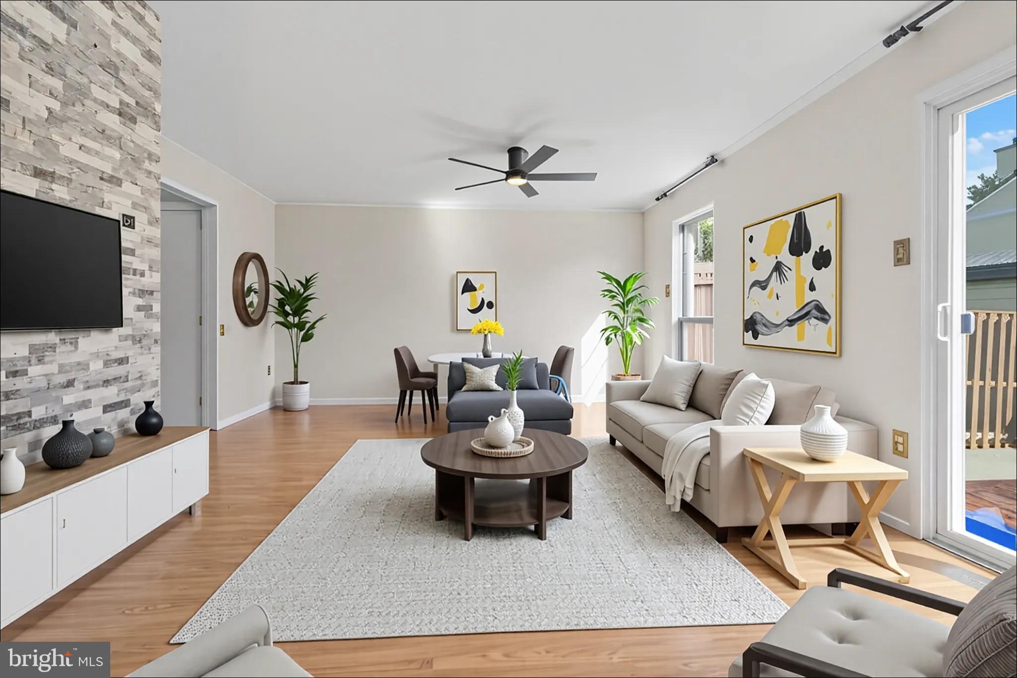 14801 Hammersmith Circle Silver Spring, MD 20906 - Photo 14 of 29 a living room with furniture and a flat screen tv