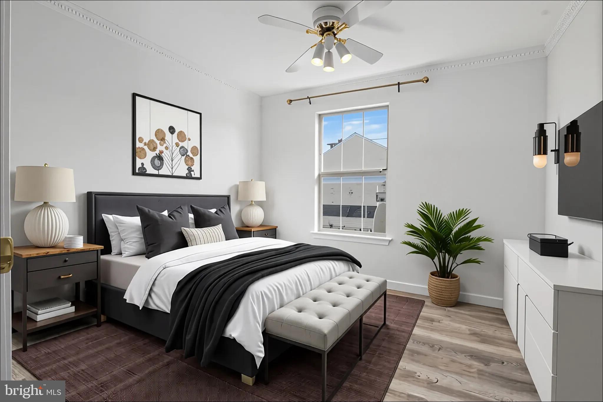 14801 Hammersmith Circle Silver Spring, MD 20906 - Photo 23 of 29 a bedroom with a bed and a chandelier