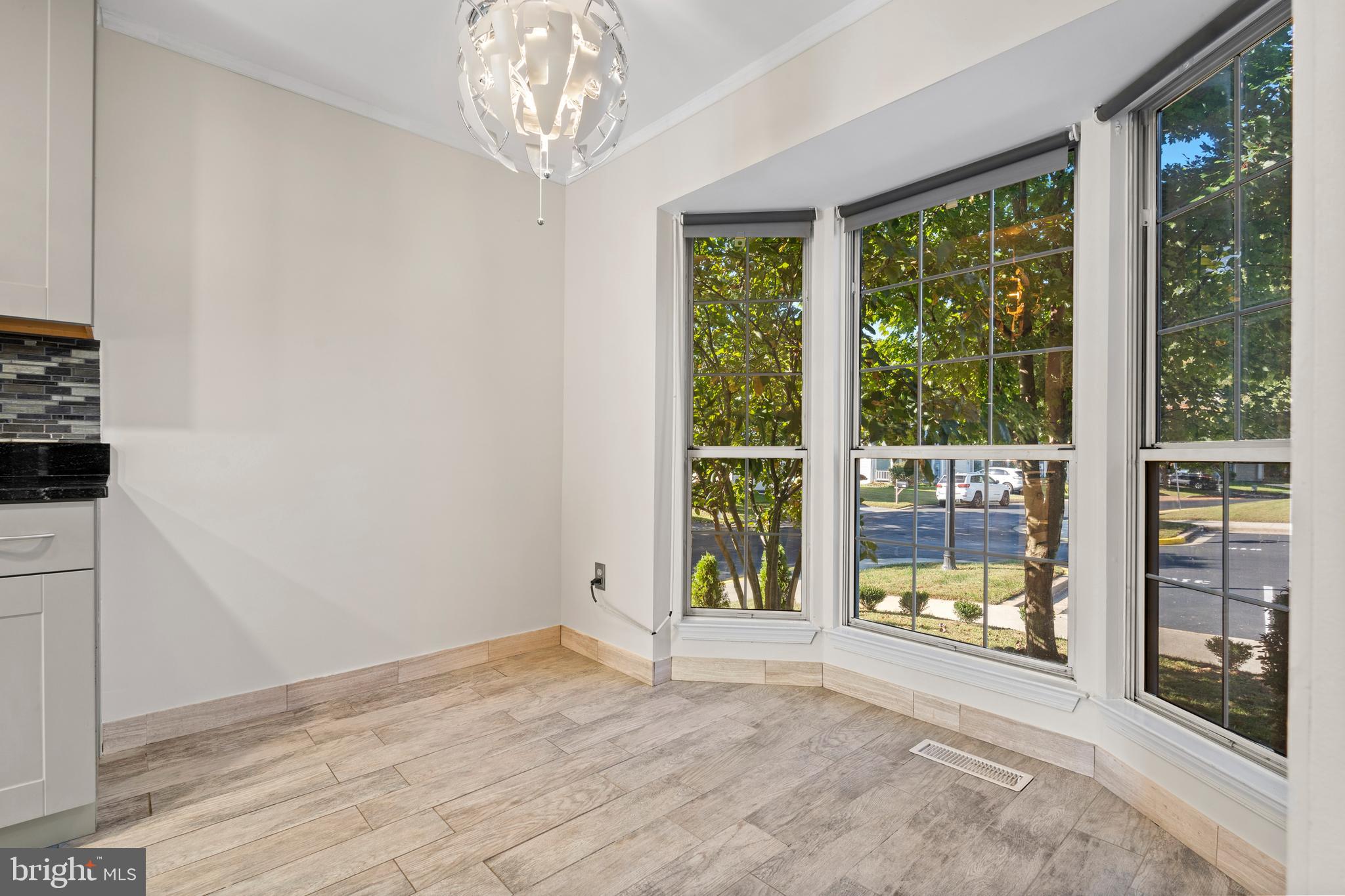 14801 Hammersmith Circle Silver Spring, MD 20906 - Photo 4 of 29 a view of an empty room with a window